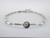 Custom design larger bezel set diamond in center bracelet