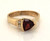 14 karat yellow gold triangular Garnet and (2) diamond ring