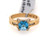 Square cut blue topaz and diamond ring