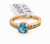 Round blue topaz and diamond ring