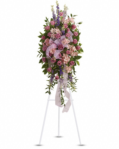 This abundant spray of soft, feminine spring colors feels as calming as a walk in the countryside. Sheer organza ribbon is threaded through lavender, purple and pink blooms that are accented by trailing greens.
Includes soothing flowers such as lavender roses and larkspur, plus pink alstroemeria.
Orientation: One-Sided