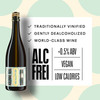Kolonne Null Cuvée N°01 Sparkling poured in a wine glass at a fine-dining table — alcohol-free sparkling wine