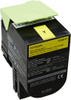 Lexmark 702hy High Capacity Return Program Toner Cartridge - Yellow, with a yellow lid open to reveal the toner fill port and label details.