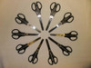 5 Star Scissors 140mm Black, set of ten scissors arranged in a circle on a light surface.
