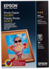 Epson Default Category A4 Glossy Photo Paper, White, 20 Sheets, product packaging featuring a smiling child in sunglasses and swimwear in a wooden photo frame against a blue sky background.