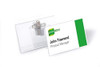 Durable Name Badge 54 x 90 mm with Combi Clip Transparent, Pack of 50 Badges, includes Blank Insert Cards, ideal for Events and Visitor Management, featuring a clear plastic badge holder with a metal clip and a blank insert card showing a sample name and title.