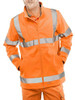 BeeSwift SS20471OR4XL Soft Shell Jacket High Visibility, 4X-Large, Orange, front view of a man wearing an orange safety jacket with reflective strips for enhanced visibility and safety.