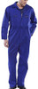 SUPER CLICK HEAVY WEIGHT BOILERSUIT ROYAL BLUE 56, a man wearing a royal blue heavy-duty boilersuit with front zipper closure and multiple pockets.