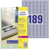 Avery L6008-20 Extra-Strong Adhesive Heavy Duty Labels, 189 Labels Per A4 Sheet - Silver, 25.4 x 10 millimetres, with a sheet of labels and their packaging shown next to a laptop.