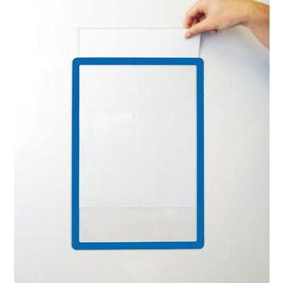 GPC OD-MFD3/10-BLU A3 Magnetic Document Frames, Blue, Pack of 10, image showing a person inserting a sheet into a blue magnetic document frame.