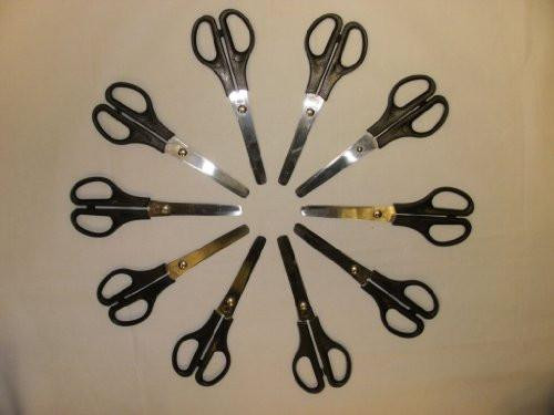 5 Star Scissors 140mm Black, set of ten scissors arranged in a circle on a light surface.