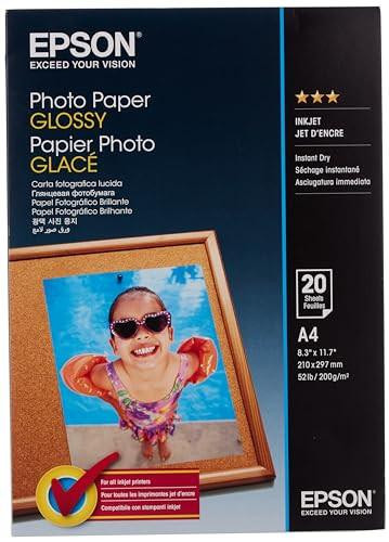 Epson Default Category A4 Glossy Photo Paper, White, 20 Sheets, product packaging featuring a smiling child in sunglasses and swimwear in a wooden photo frame against a blue sky background.