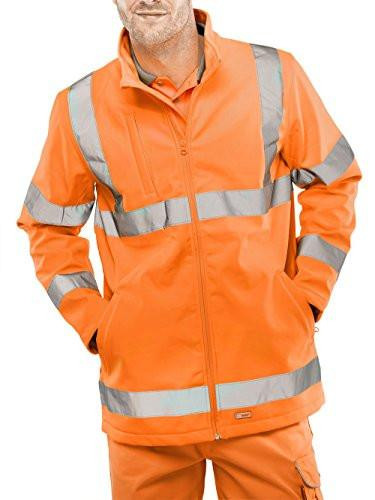 BeeSwift SS20471ORXXL Soft Shell Jacket High Visibility, 2X-Large, Orange, worn by a man with hands in pockets, featuring reflective stripes for safety in high-visibility work environments.