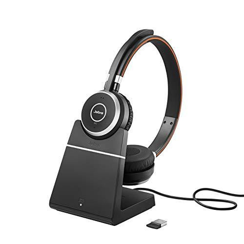 Jabra Evolve 65 SE Wireless Stereo Headset - Bluetooth Headset with Noise-Cancelling Microphone on Charging Stand, featuring long-lasting battery, sleek black design, and compatible with MS Teams and all other platforms.