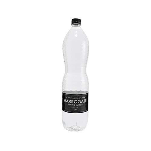 Harrogate Spa Bottled Water Still 1.5 Litre PET Black Label/Cap Pack of 12, a transparent plastic water bottle with black label and cap.