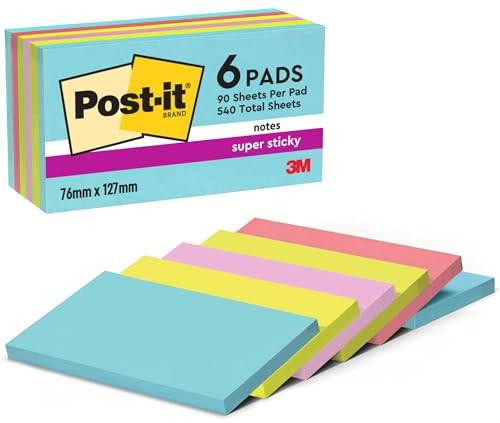 Post-it Super Sticky Notes, Double the Sticking Power, 6 Pads, 540 Sheets, 76 mm x 127 mm, Blue, Green, Pink Colors - Self-Sticking Notes for Walls, Monitors, and Fridge, with colorful pads arranged in front of the packaging.