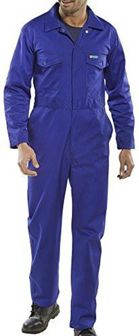 CLICK BOILERSUIT ROYAL BLUE 46, a full-length male model wearing a royal blue work boilersuit with a front zipper, collar, and multiple pockets for safety and durability.