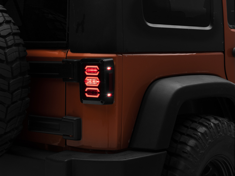 Raxiom 07-18 Jeep Wrangler JK LED Tail Lights- Black Housing (Smoked Lens)