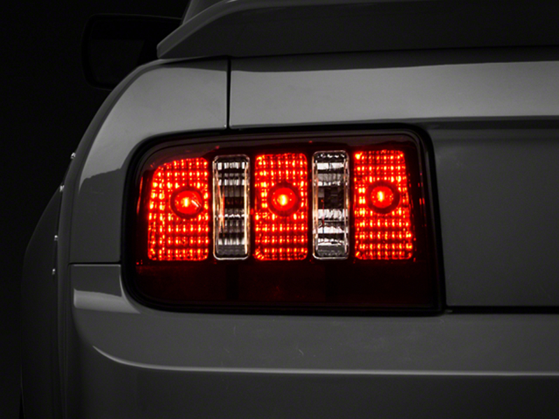 Raxiom 05-09 Ford Mustang Coyote Tail Lights- Black Housing (Smoked Lens)