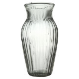 A clear lined glass vase