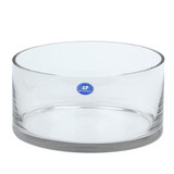 A clear glass cylinder bowl, manufactured by Kaleidoscope.