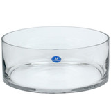 A clear glass cylinder bowl, manufactured by Kaleidoscope.