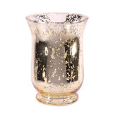 A champagne coloured glass hurricane vase, manufactured by Kaleidoscope.