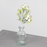 A festive pick decoration with glittered mistletoe and berries. A festive pick decoration with glittered mistletoe and berries.