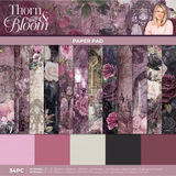 A 12" x 12" Thorn & Bloom Paper Pad, manufactured by Crafter's Companion.