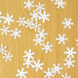 A pack of 17mm white assorted snowflake sequins, manufactured by Hunkydory Crafts.