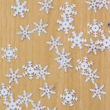 A pack of 17mm silver assorted snowflake sequins, manufactured by Hunkydory Crafts.