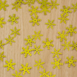 A pack of 17mm gold assorted snowflake sequins, manufactured by Hunkydory Crafts.