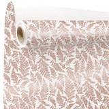 A roll of Cyrielle copper patterned white kraft paper, manufactured by Clayrtons.