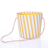 A Mustard & White Stripes Round Floral Pot.