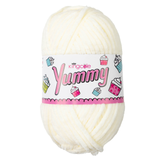A 100g ball of Yummy Chunky Cream Polyester Yarn, manufactured by King Cole.