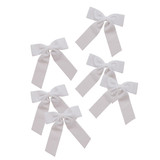 A pack of 6 White Velvet Bow Clip Decorations.