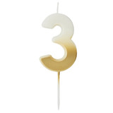 A 6.2cm Gold Ombre Number 3 Candle, manufactured by Hootyballoo.
