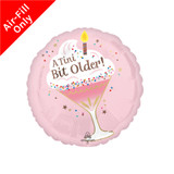 A 9 inch A Tini Bit Older Birthday Foil Balloon, manufactured by Anagram.
