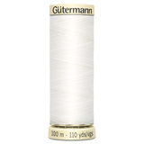 A 100m spool of White Sew All Thread, manufactured by Gutermann.