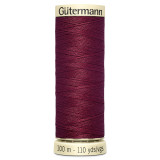 A 100m spool of Garnet Sew All Thread, manufactured by Gutermann.