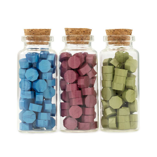 Three jars of jewel toned wax seals beads in blue, red and green that can be used with The Everyday Wax Seal Kit which is made by Crafter's Companion.