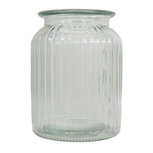 A clear ribbed glass jar vase