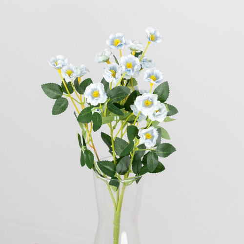An artificial bunch of blue buttercups. An artificial bunch of blue buttercups.