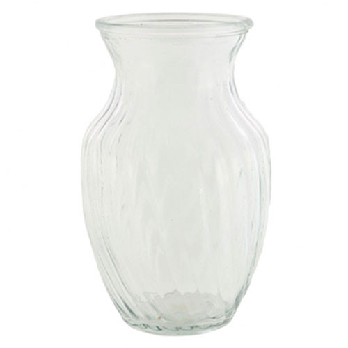 A clear glass sweet pea vase