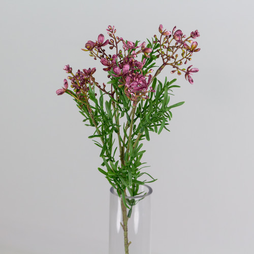 An artificial dark red Broom Bloom