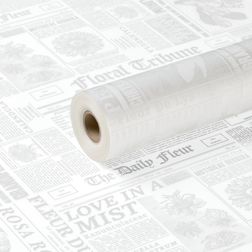 A roll of White Newspaper Sienna Print Frosted Film, measuring approx. 80cm x 80m.