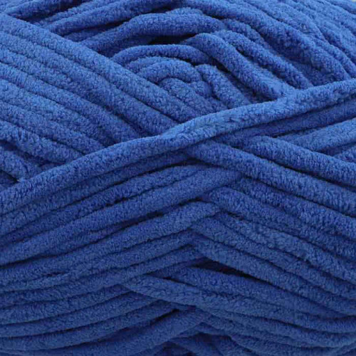 A 200g ball of Warm & Toastie Super Chunky Royal Polyester Yarn, manufactured by King Cole.