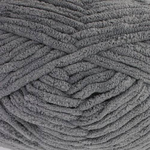 A 200g ball of Warm & Toastie Super Chunky Silver Polyester Yarn, manufactured by King Cole.