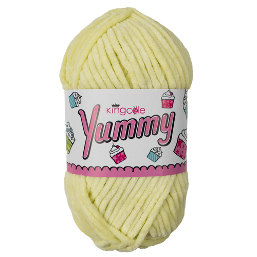 A 100g ball of Yummy Chunky Lemon Polyester Yarn, manufactured by King Cole.