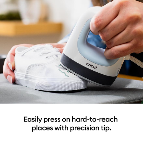 A Cricut Easypress Mini, in Zen Blue.